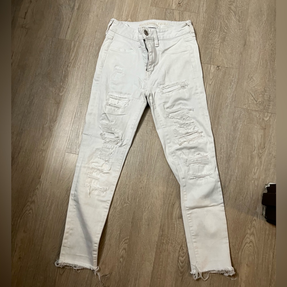 American Eagle distressed white skinny jeans